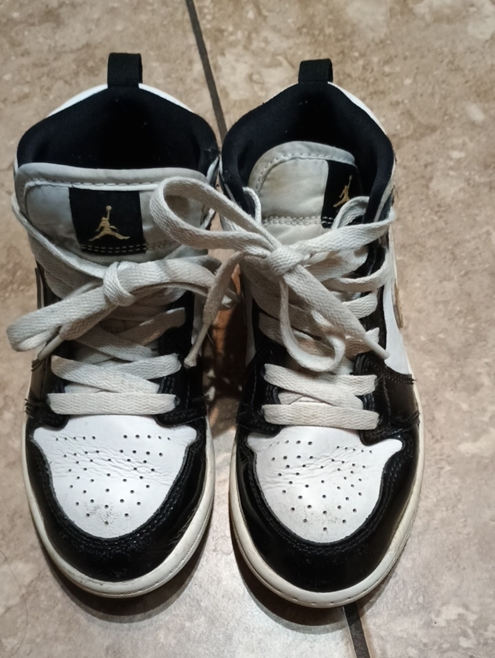 Jordan Kids Black and White High-Top Sneakers